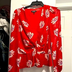 Flattering blouse from Express! Can be worn as a date night or work top